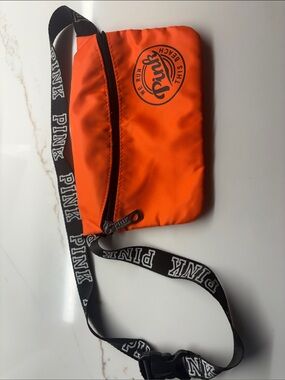 PINK Victoria's Secret Bright Orange Crossbody Belt Bag with Branded Black Strap